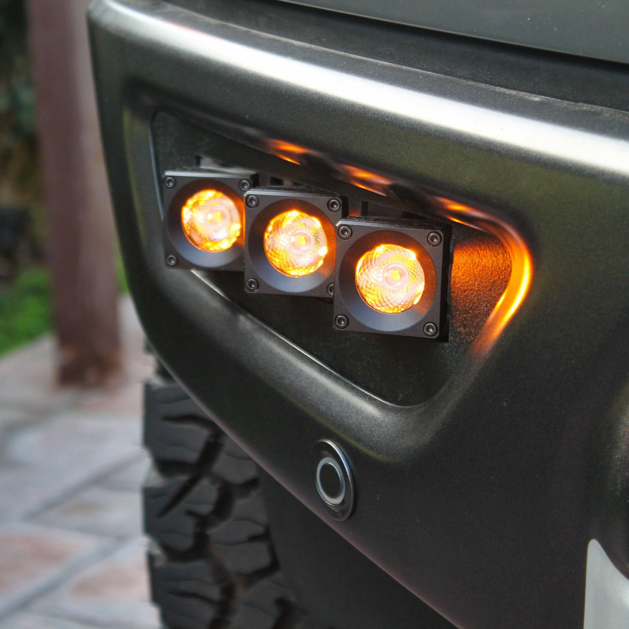 up close view gray 2021 2022 2023 ford raptor generation 3 with 3 amber 20watt squares