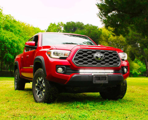 2016 2017 2018 2019 red Toyota Tacoma with one white 30in Light Bar
