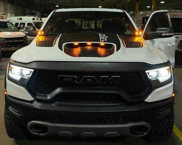 Why AUX Switches Are a Game Changer for Off-Road Lighting - rugged RAM truck with auxiliary lights and wiring upgrades