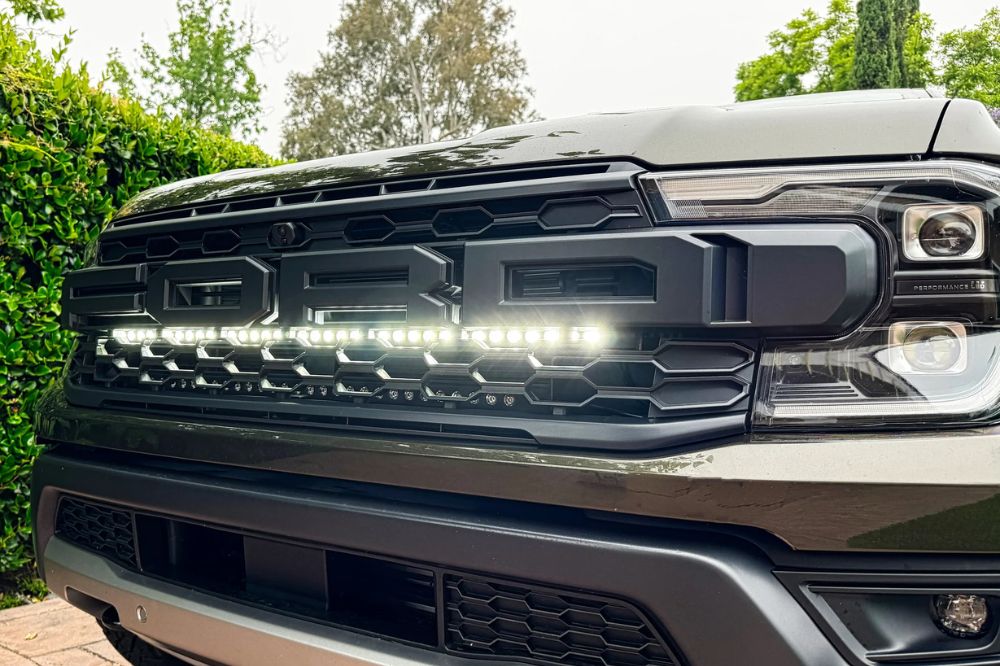 Enhancing Nighttime Driving with Premium Light Bars - Close-up of a truck front with premium LED light bars for improved night visibility