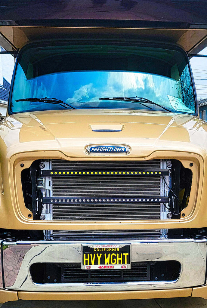 2021 2022 2023 Freightliner Super C RV with two 30in light bars behind the grille color by M&R automotive