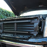 nissan titan grille off showing two led light bars and metal brackets for off roading