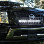 black nissan titan with one led light bar behind the grille in white color for off roading