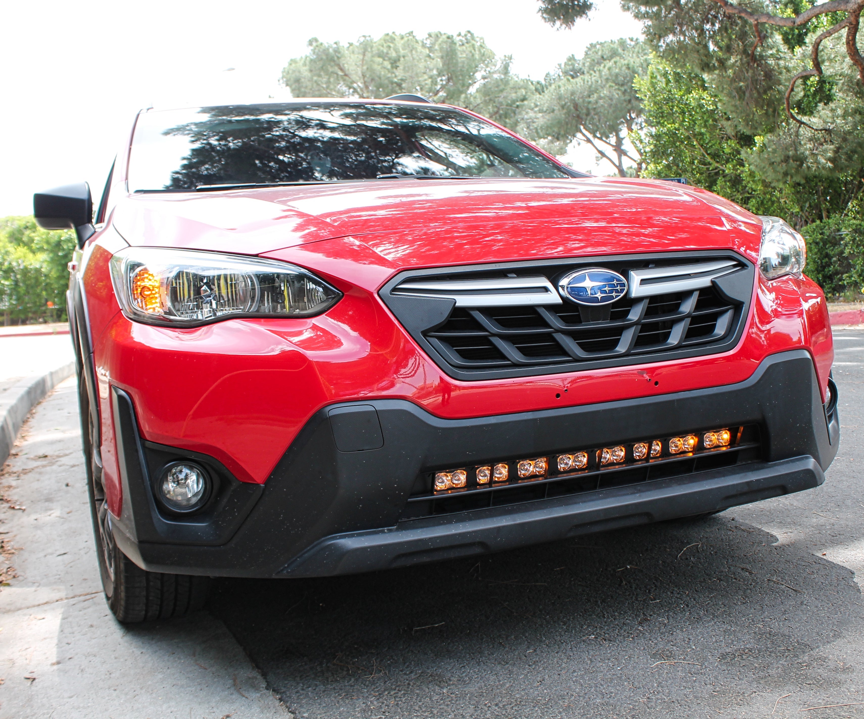 red 2022 subaru crosstrek gen 2 light bar off roading in lower grille