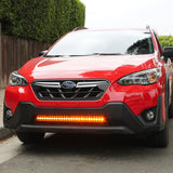 red 2021 subaru crosstrek gen 2 with light bar in lower grille for off roading