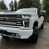 2020 2021 2022 2023 white Chevrolet Silverado 2500/3500HD one white 40in Light Bar behind the grille by M&R Automotive