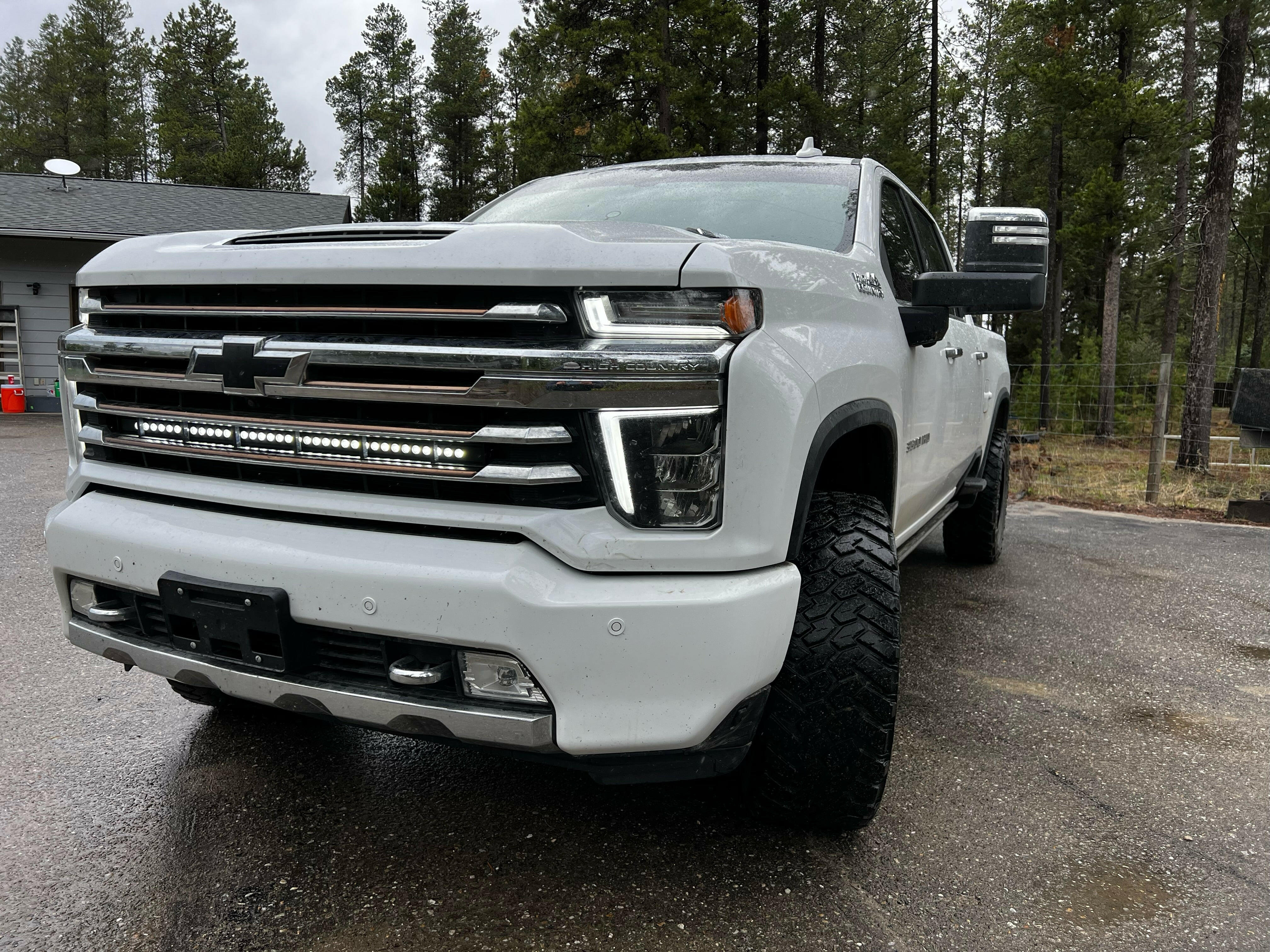 2020 2021 2022 2023 white Chevrolet Silverado 2500/3500HD one white 40in Light Bar behind the grille by M&R Automotive