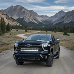 Chevrolet Silverado Light Bars on rugged black pickup in mountain landscape