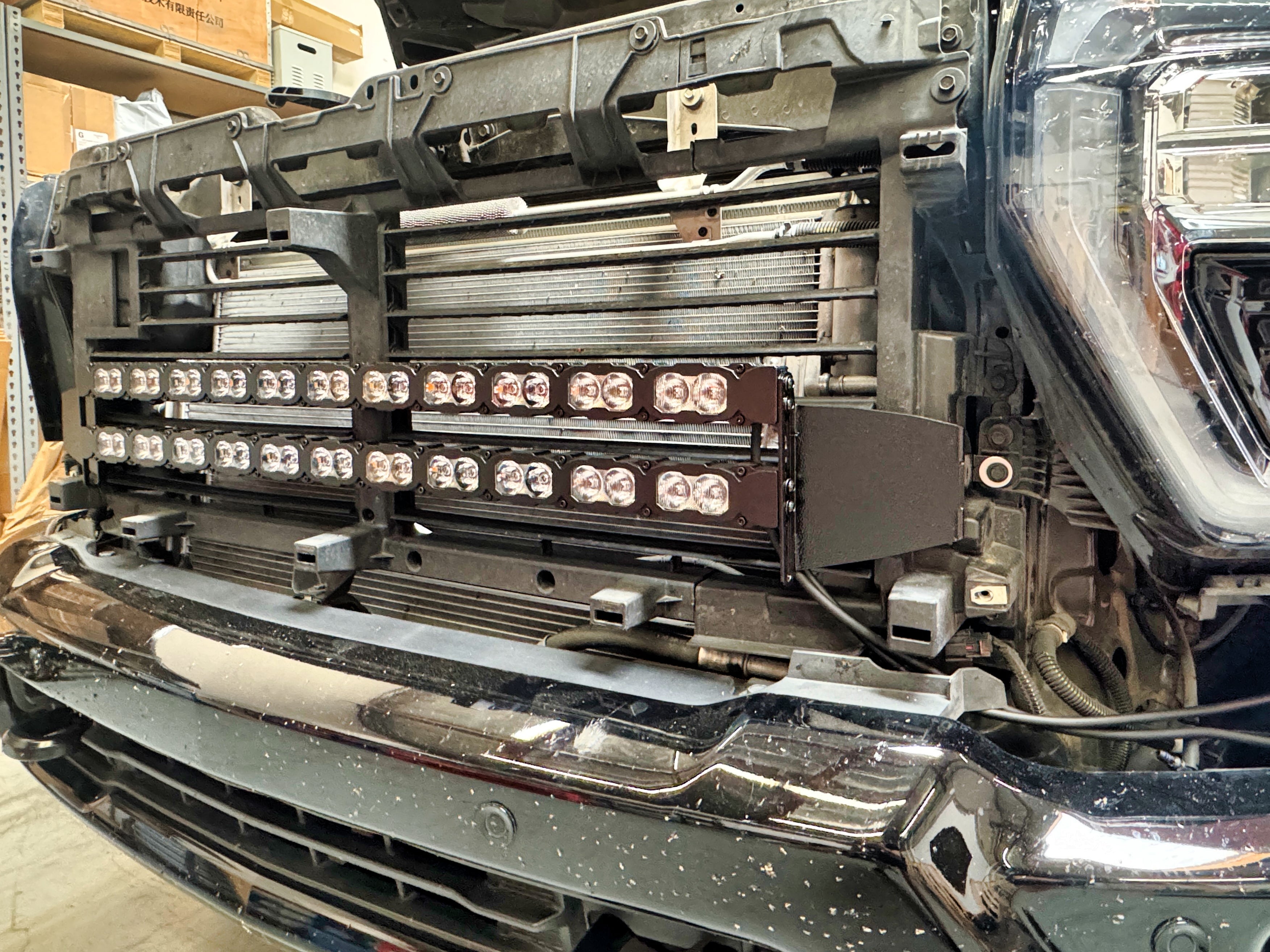 Chevrolet Silverado Light Bars mounted on a 2020-2026 Silverado 2500/3500HD grille with rail-mount system, bottom-half grille fitment for PRO version