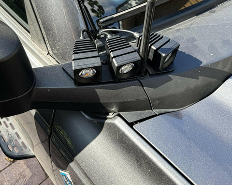 ford bronco passenger side top view of 3 light pods ditch lights