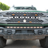 front view of green 2023 bronco capable bumper with led light bar installed on top for off roading