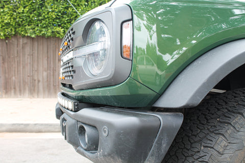 side view green 2022 bronco capable bumper with led light bar installed on top for off roading