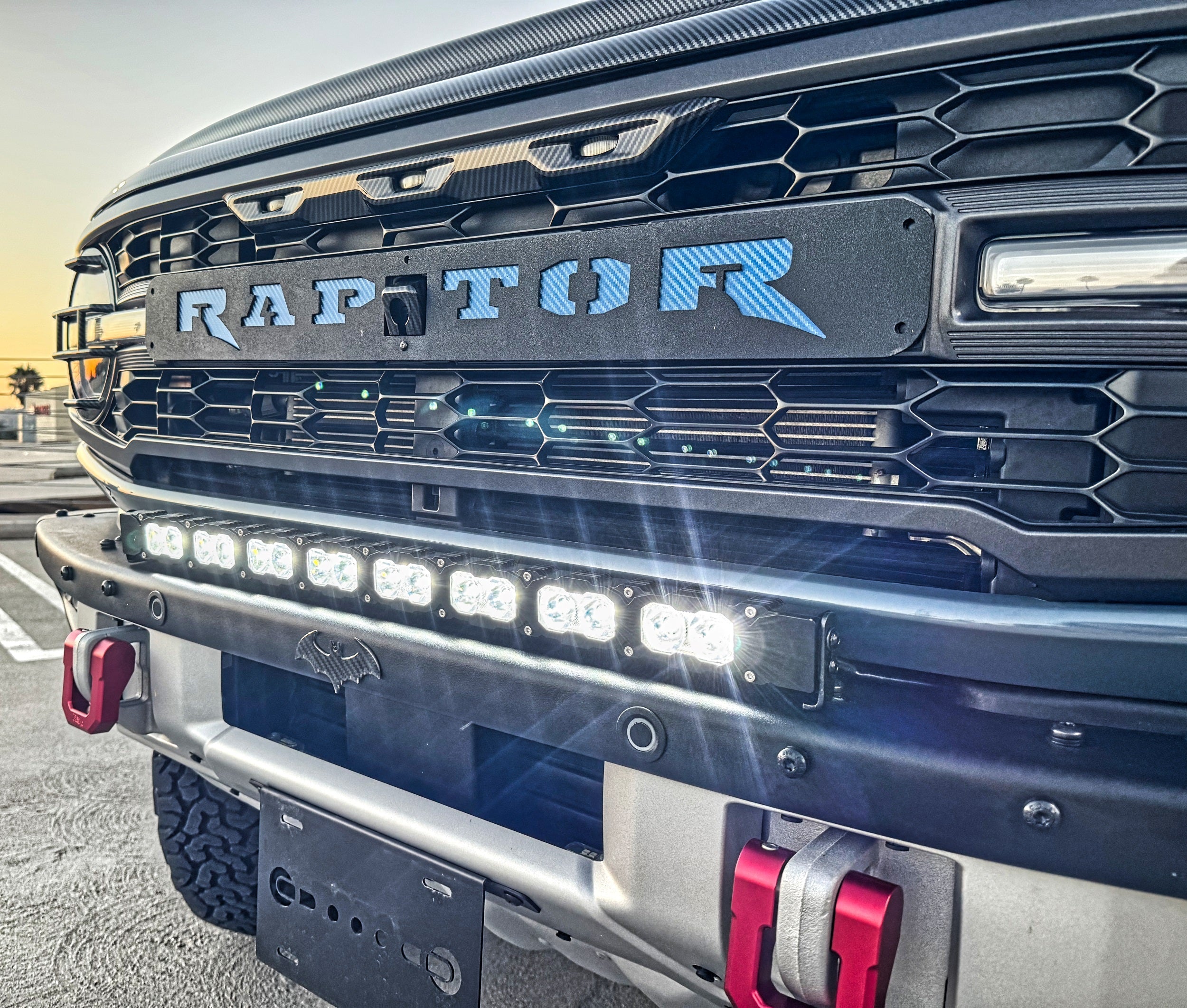 Ford Bronco Raptor 30in Light Bar on front bumper of 2021+ Ford Bronco Raptor with integrated LED bar, black powder-coated bracket, sleek built-in look