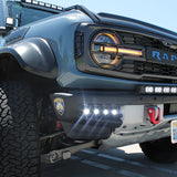  ford bronco raptor with white led light bar on bumper and roof plus fog lights