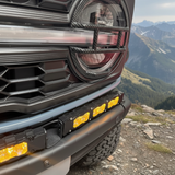 Bronco Raptor Lightbar kit is a 40in curved LED light bar with 12in extension for Ford Bronco Raptor 2021+—slim, built-in look with black powder-coated metal brackets
