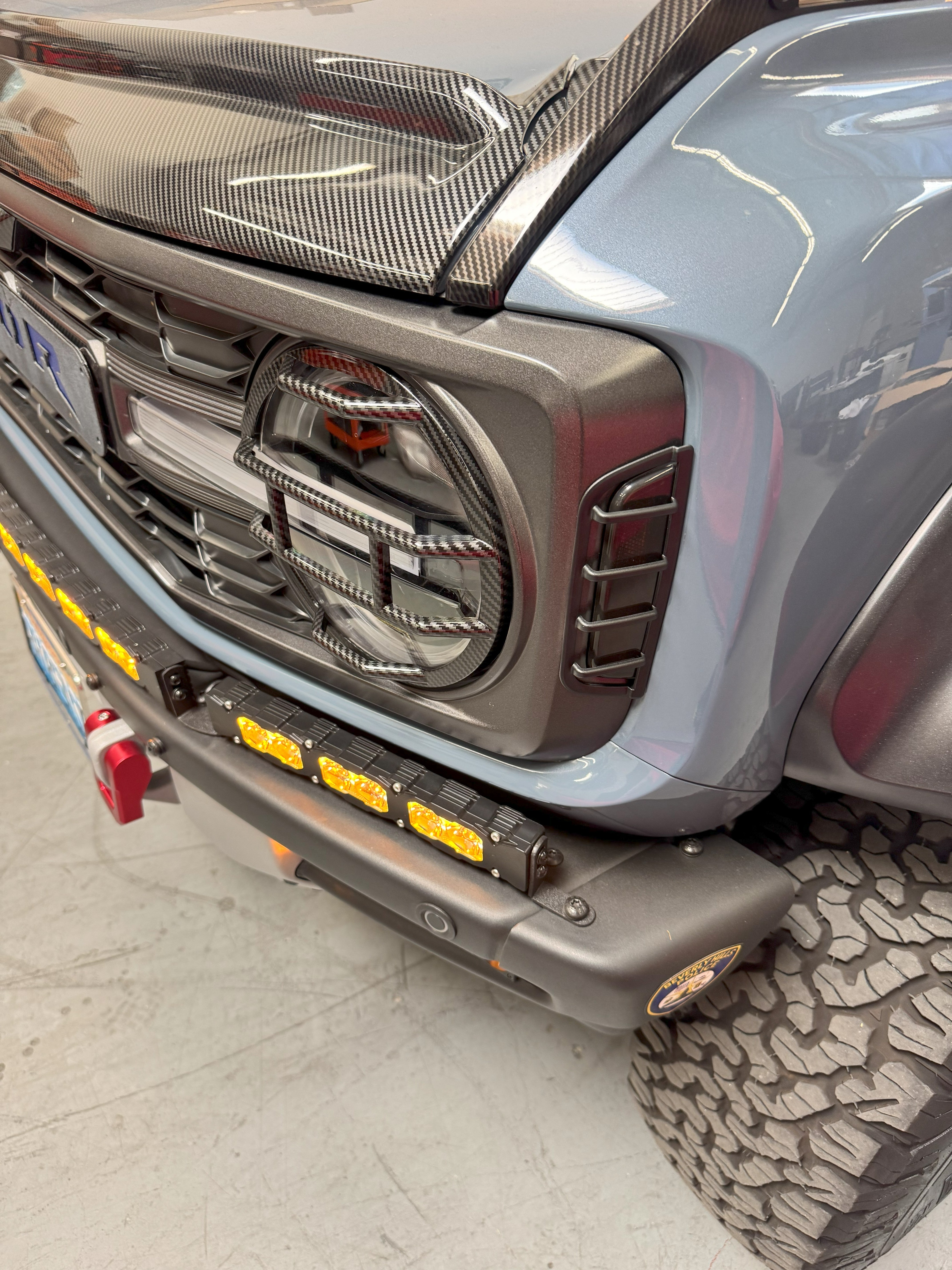 Ford Bronco Raptor Light Bar Extension for 2021+ showcases 12in PRO light bars installed on modular bumper with front bumper lighting and rugged off-road styling