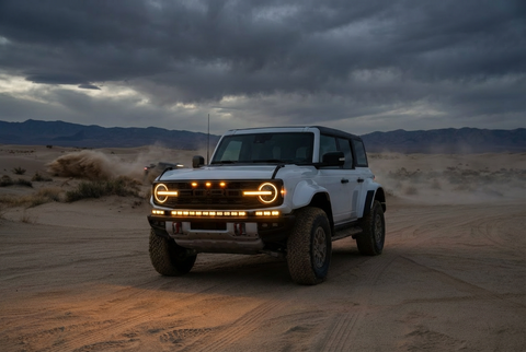 Bronco Raptor Lightbar kit featured on rugged Ford Bronco Raptor with 40in curved LED light bar and 12in extension, slim built-in look, black powder-coated metal brackets
