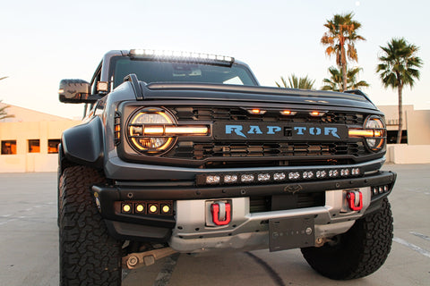 Ford Bronco 40in Roof Light Bar image showcasing rugged Raptor front with curved LED bars and black powder-coated brackets