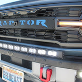 upclose view ford bronco raptor with white curved led light bar on top of bumper