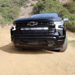 Black 2022+ Chevrolet Silverado 1500 with dual 40in LED light bars behind the front grille