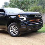 Black Chevrolet Silverado 1500 with dual 40in grille-mounted LED light bars, front view