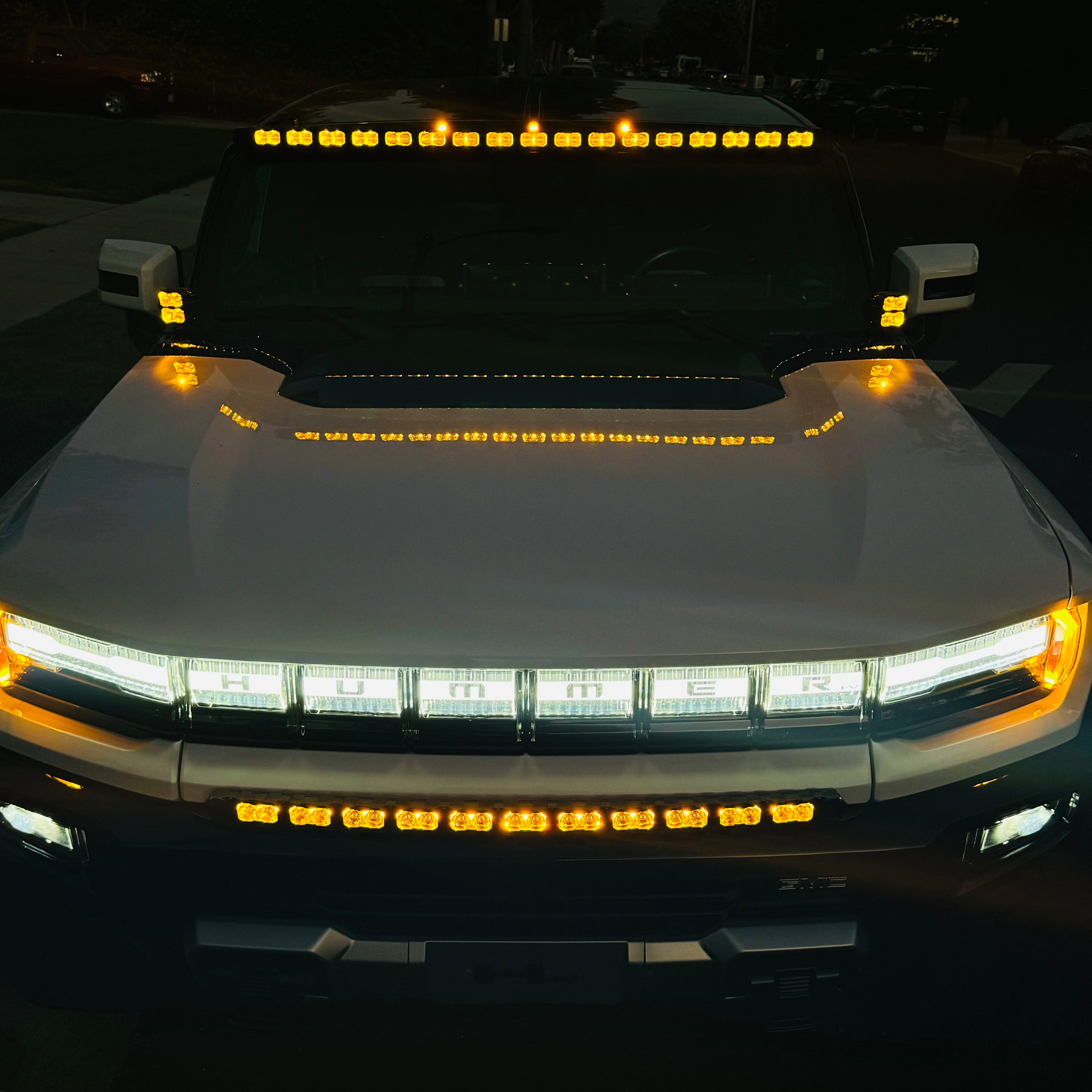 Hummer EV ditch lights PRO 2022+ full LED, amber running and top roof lights on white GMC Hummer EV, includes adjustable pods and low-profile, easy install