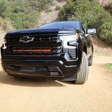 black chevrolet silverado 1500 off road light bar front grille, amber