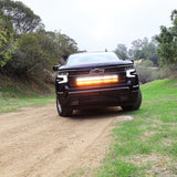 Black Chevrolet Silverado 1500 with dual 40in off-road LED light bars in the grille