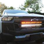 2023 2024 white chevrolet colorado with behind grille 30in light bars white and amber