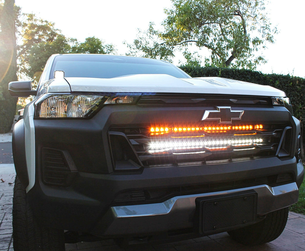 2023 2024 white chevrolet colorado with behind grille 30in light bars white and amber