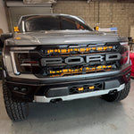 2024+ Ford Raptor Gen 3 Refresh Guard Plate - rugged front view with aggressive front grille and orange LED lights