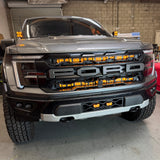 2024+ Ford Raptor Gen 3 Refresh Guard Plate - rugged front view with aggressive front grille and orange LED lights