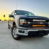 2024+ Ford F150 dual 30in Light Bars on front grille showing orange LED bar accents for Ford F-150 pickup truck