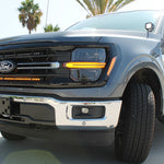 Ford F150 hood-mount ditch lights and pillar pods with amber DRL backglow for 2024+ F150