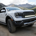 white 2025 ford ranger with light bar on top of the bumper installed and off road ditch lights