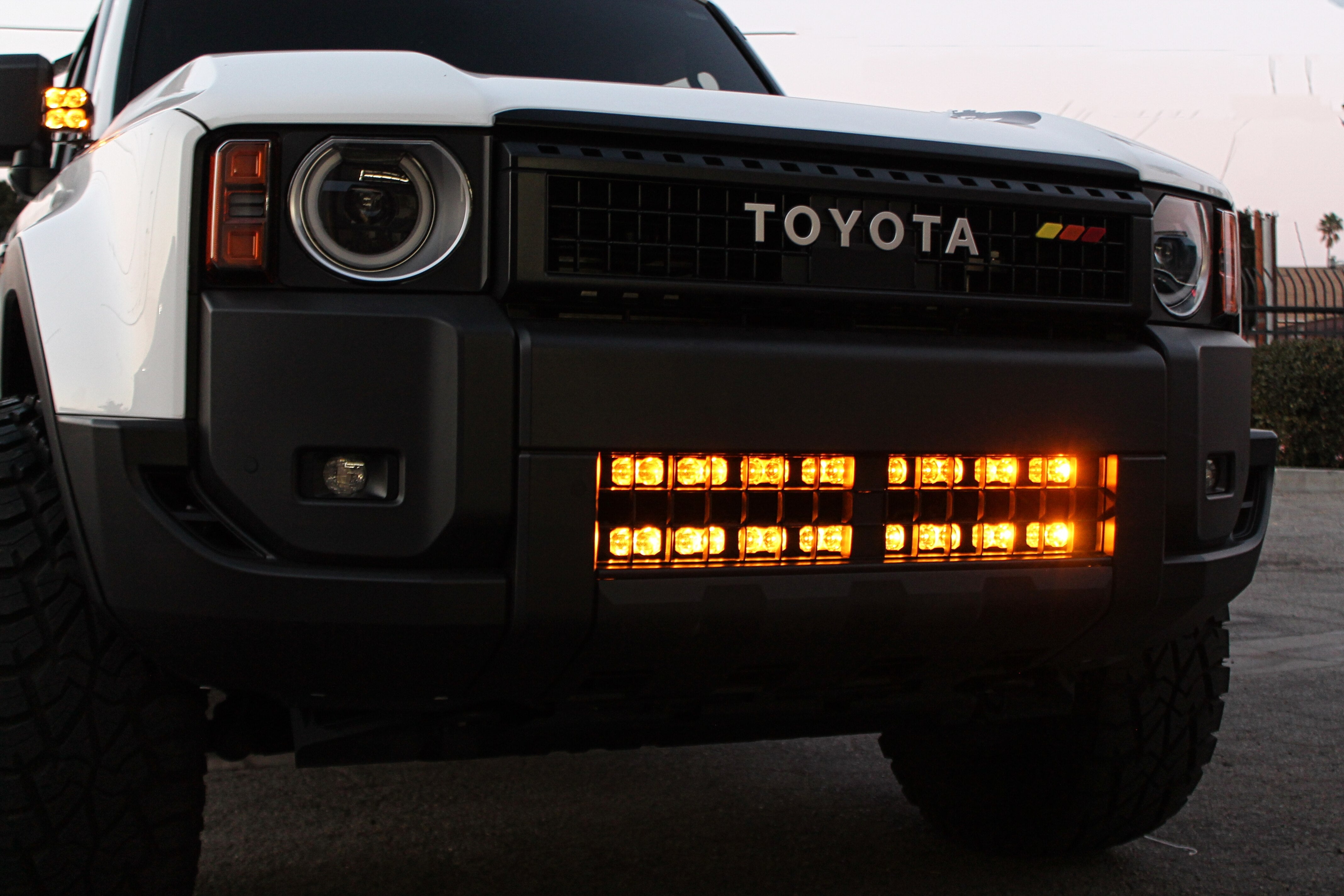 Land Cruiser Light bars on 2024+ Toyota Land Cruiser front bumper with grille removed, installed behind lower grille, does not affect radiator cooling