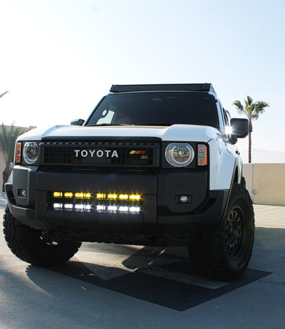 Land Cruiser Light bars installed on 2024+ Toyota Land Cruiser, front view showing lower grille-mounted LED light bar, does not affect cooling