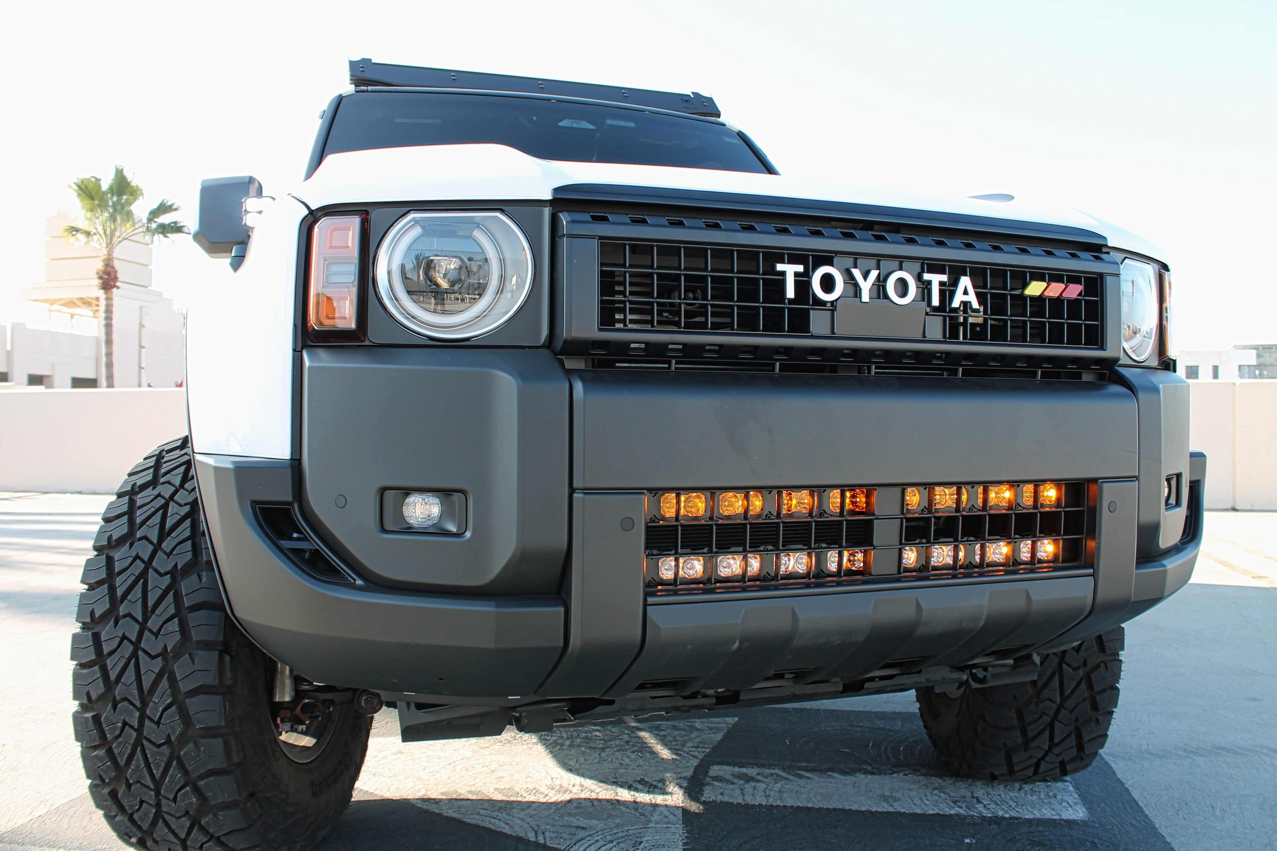 Land Cruiser Light bars on 2024+ PRO for Toyota Land Cruiser, installs behind lower grille behind front bumper; does not affect radiator cooling
