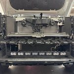 Land Cruiser Light bars on 2024+ Toyota Land Cruiser front with grille removed, showcasing installed light bars and 12 LED pods