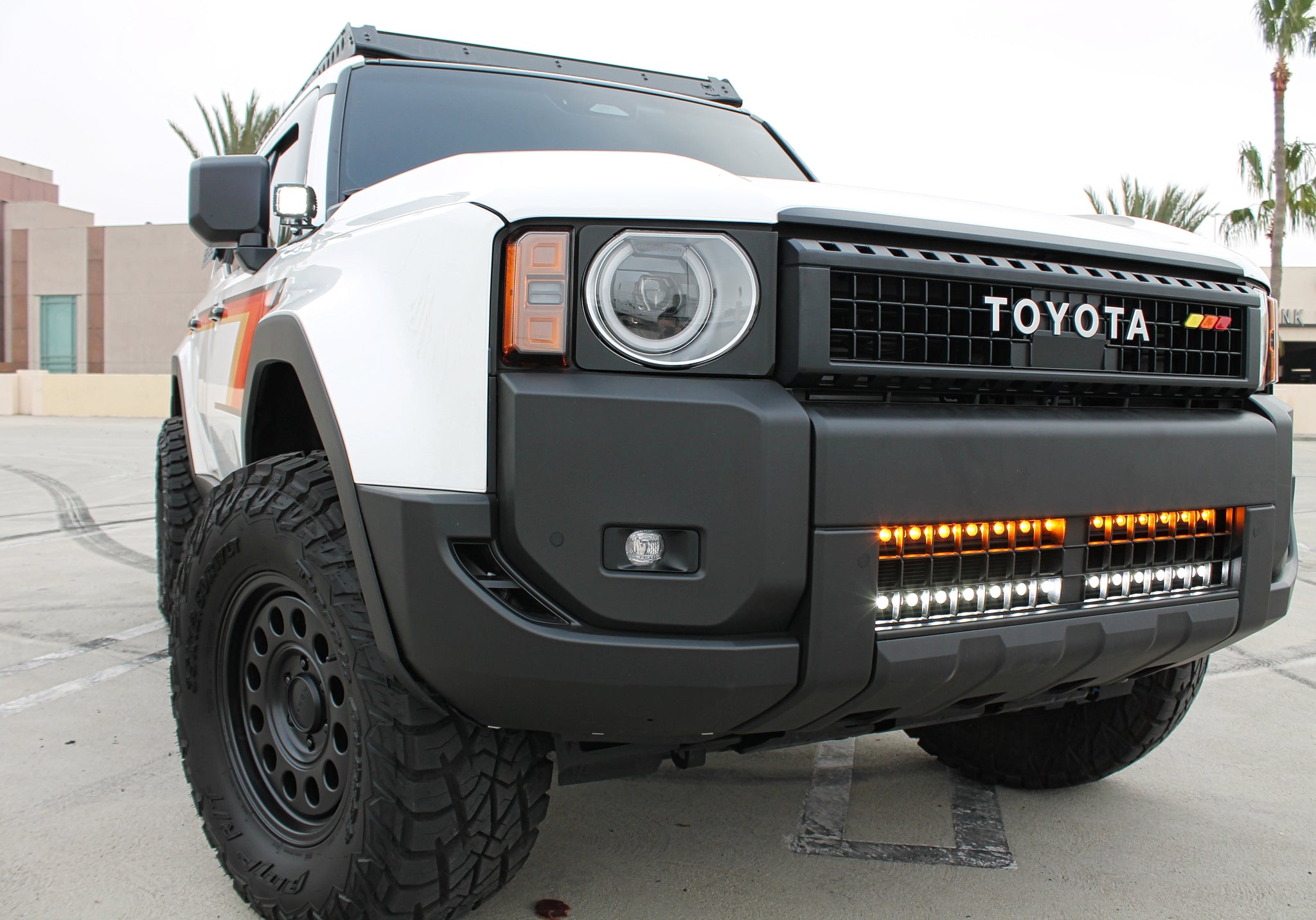 Land Cruiser light bar front view on 2024+ Toyota Land Cruiser with off-road bumper and LED light bar
