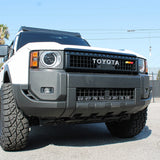 Land Cruiser light bar in front view on 2024+ Toyota Land Cruiser — installation behind lower grille, front grille removal required