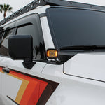 Land Cruiser ditch lights on 2024+ model with amber DRL backglow and white LED main light for Toyota Land Cruiser 2024-2026