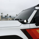 Land Cruiser ditch lights on 2024+ Toyota Land Cruiser, dual color white LED with amber DRL backglow on side of rugged SUV