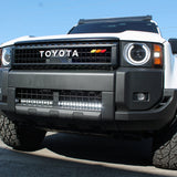 Land Cruiser lightbar installed on 2024+ Toyota Land Cruiser front bumper, front grille removed for access, does not affect radiator cooling