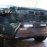 gray 2024 toyota tacoma led light bar behind grille white color
