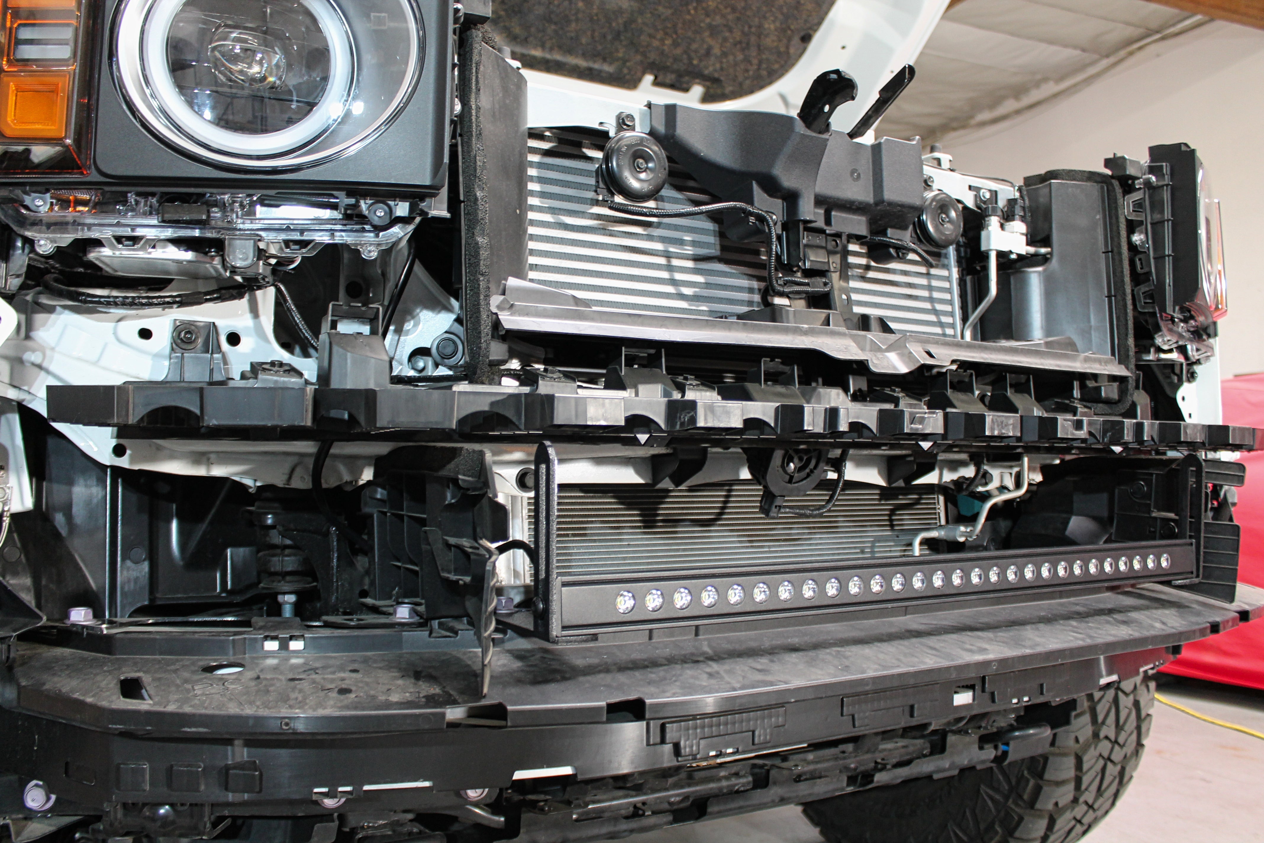 Land Cruiser lightbar front view installed on 2024+ Toyota Land Cruiser with slim profile behind lower grille