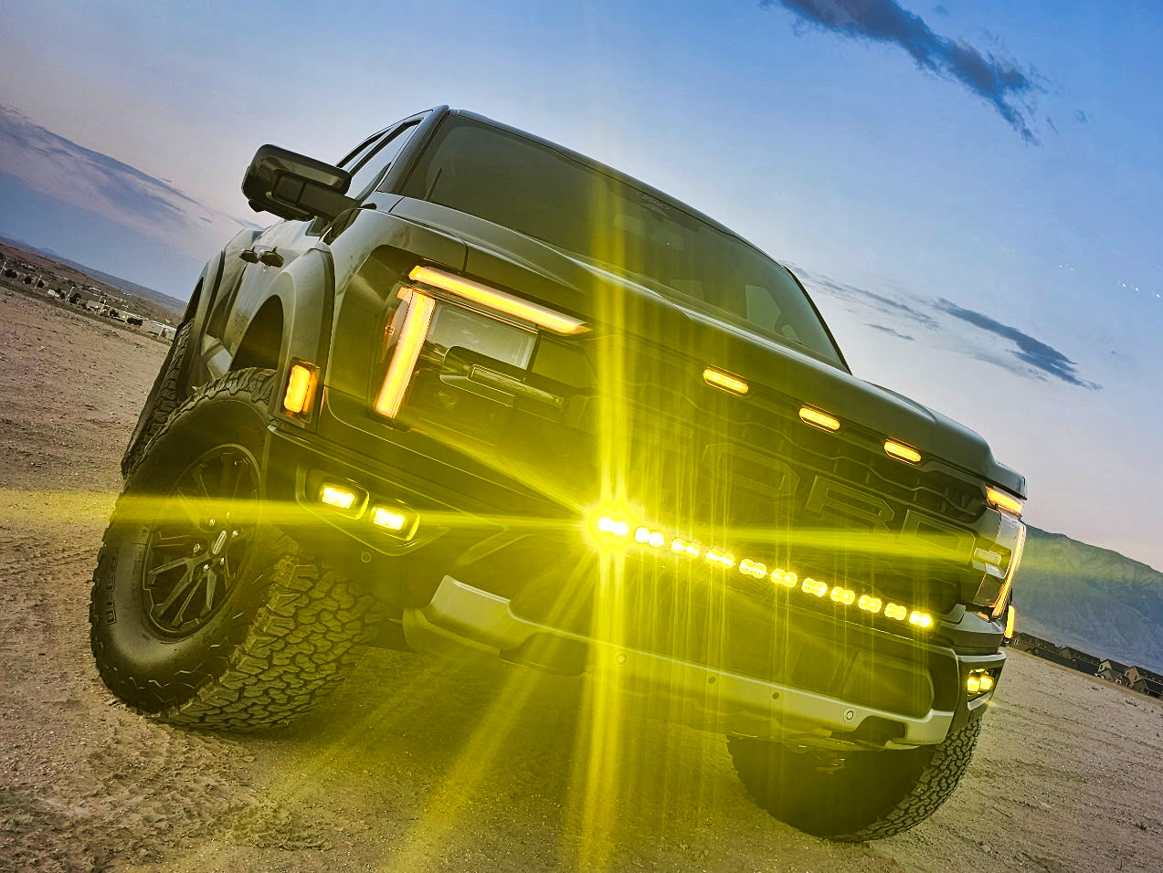 2024+ Ford F150 Raptor with amber light bar installed, showcasing the Ford F150 Raptor Light Bar in action.