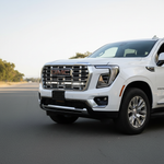 2026 white gmc yukon with led light bars behind grille for off roading