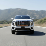 2026 white gmc yukon with led light bars behind grille for off roading