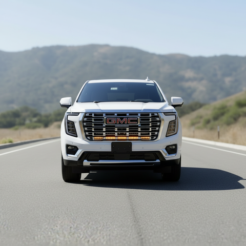 2026 white gmc yukon with led light bars behind grille for off roading
